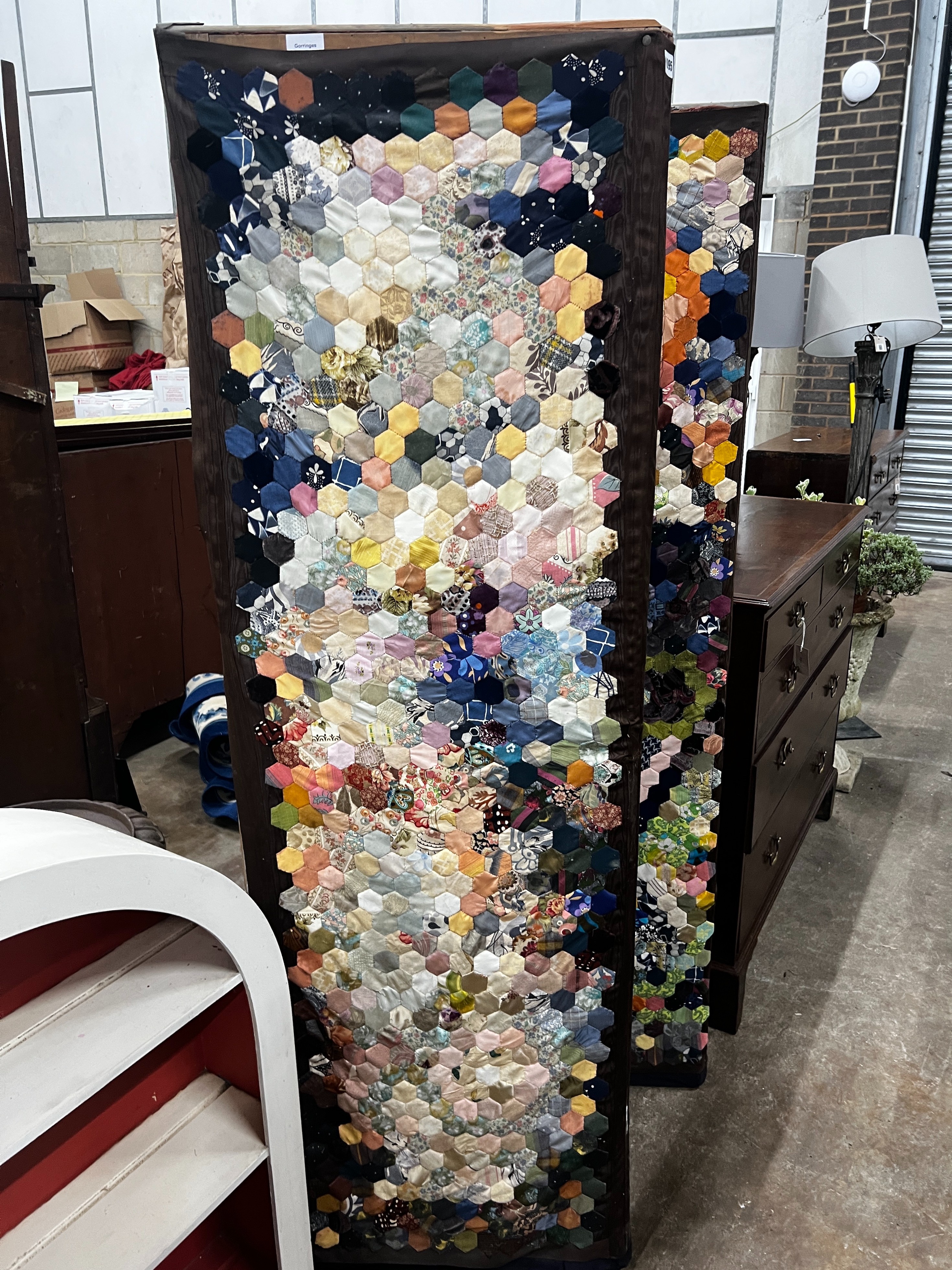 A four fold dressing screen with patchwork fabric panels, each panel width 55cm, height 177cm